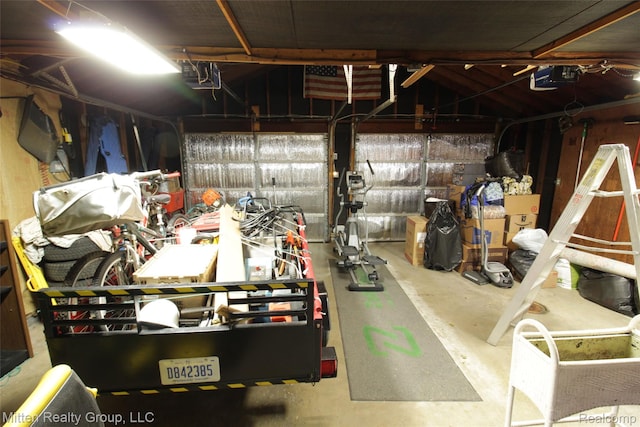 41079 E Ann Arbor Trl, Plymouth, MI 48170 - garage featuring a garage door opener