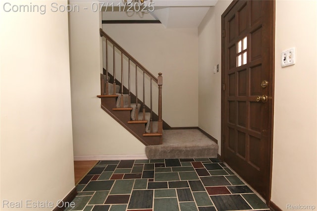 53347 Mark Dr, Shelby Twp, MI 48316 - foyer entrance with a chandelier and stairway