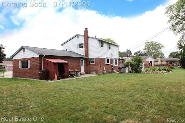 53347 Mark Dr, Shelby Twp, MI 48316 - rear view of property featuring brick siding, a chimney, a patio, and an outdoor structure