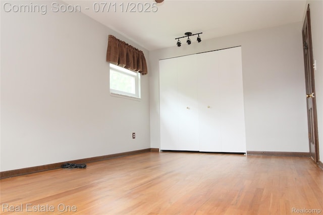 53347 Mark Dr, Shelby Twp, MI 48316 - empty room with light wood finished floors and baseboards