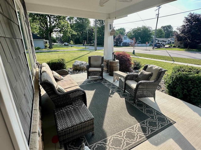 308 W Hosmer St, Saint Charles, MI 48655 - porch featuring ceiling fan and a yard