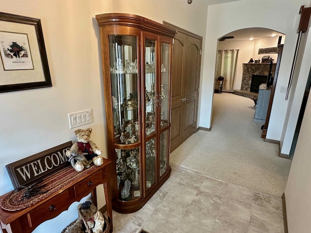 308 W Hosmer St, Saint Charles, MI 48655 - hallway featuring arched walkways and carpet