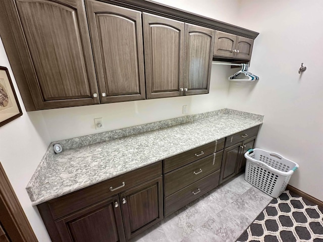 308 W Hosmer St, Saint Charles, MI 48655 - kitchen featuring dark brown cabinets and light countertops