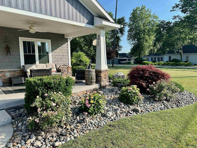 308 W Hosmer St, Saint Charles, MI 48655 - view of green lawn featuring ceiling fan and outdoor lounge area