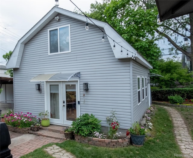 1036 Irving Ave, Royal Oak, MI 48067 - rear view of property featuring french doors and a gambrel roof