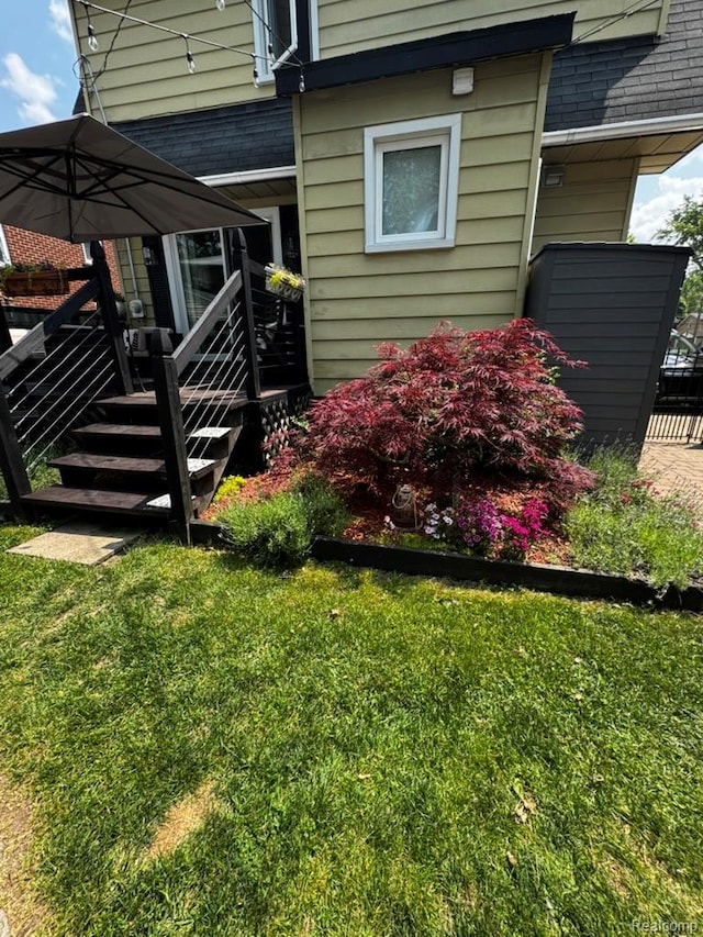 1036 Irving Ave, Royal Oak, MI 48067 - view of side of property featuring a deck and a yard