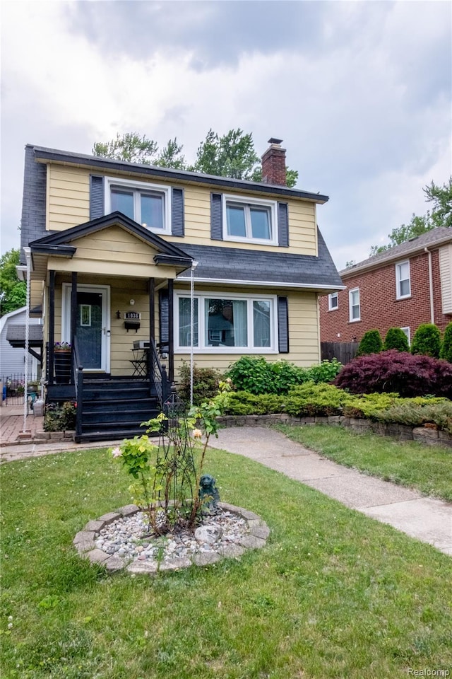 1036 Irving Ave, Royal Oak, MI 48067 - view of front of property with a chimney, a front yard, and a porch
