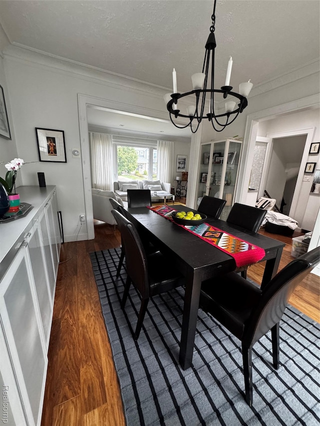 1036 Irving Ave, Royal Oak, MI 48067 - dining area featuring ornamental molding, a chandelier, and wood finished floors