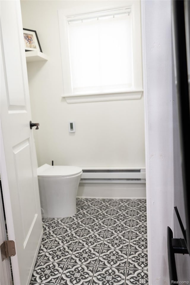1036 Irving Ave, Royal Oak, MI 48067 - bathroom with a baseboard heating unit and toilet