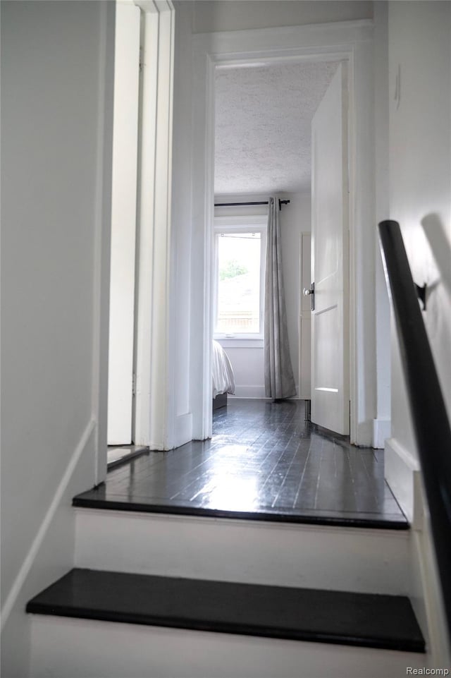 1036 Irving Ave, Royal Oak, MI 48067 - stairs featuring a textured ceiling and baseboards
