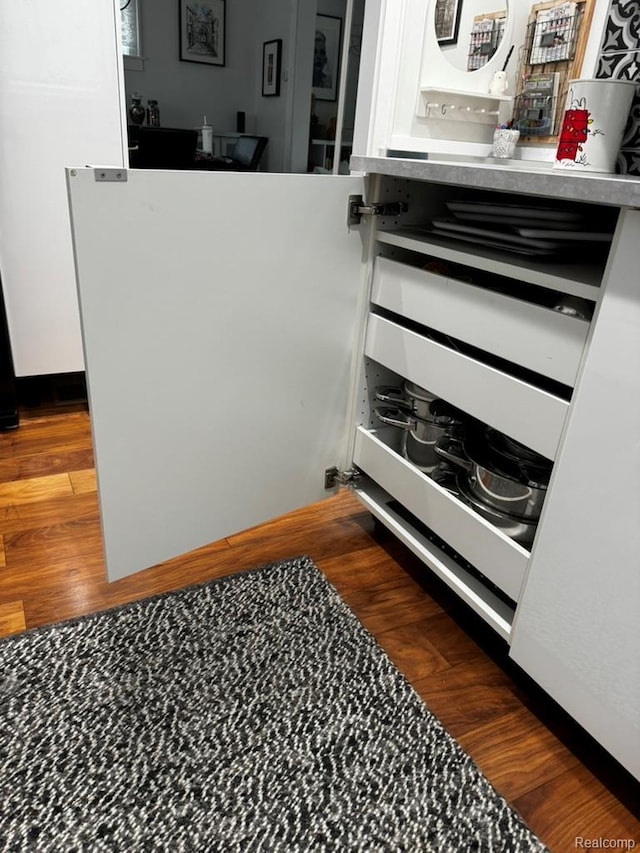 1036 Irving Ave, Royal Oak, MI 48067 - kitchen view of dark wood-type flooring and white cabinetry