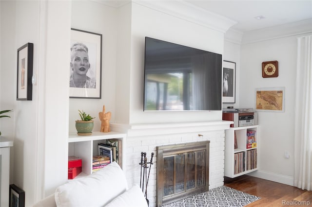 1036 Irving Ave, Royal Oak, MI 48067 - living area featuring a fireplace, wood finished floors, and crown molding