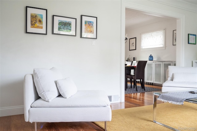 1036 Irving Ave, Royal Oak, MI 48067 - living area with wood finished floors and ornamental molding