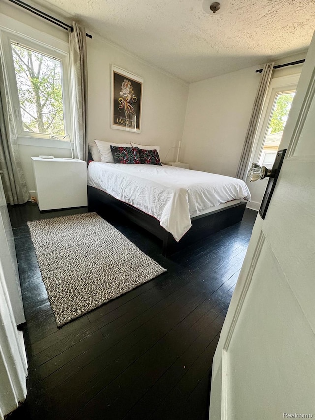 1036 Irving Ave, Royal Oak, MI 48067 - bedroom featuring a textured ceiling and hardwood / wood-style flooring