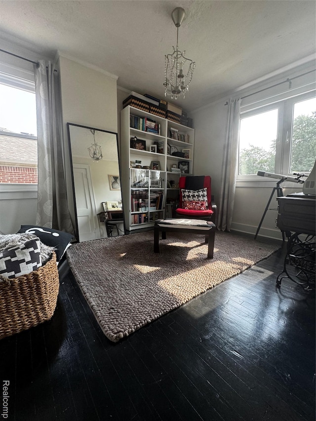 1036 Irving Ave, Royal Oak, MI 48067 - living area featuring a chandelier, hardwood / wood-style flooring, and a textured ceiling