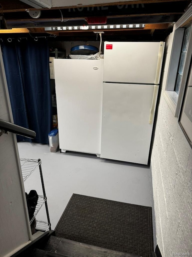 1036 Irving Ave, Royal Oak, MI 48067 - interior space featuring freestanding refrigerator and concrete floors