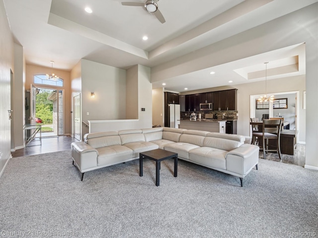 2655 Devondale Rd, Rochester Hills, MI 48309 - living room featuring a raised ceiling, a chandelier, carpet, ceiling fan, and recessed lighting