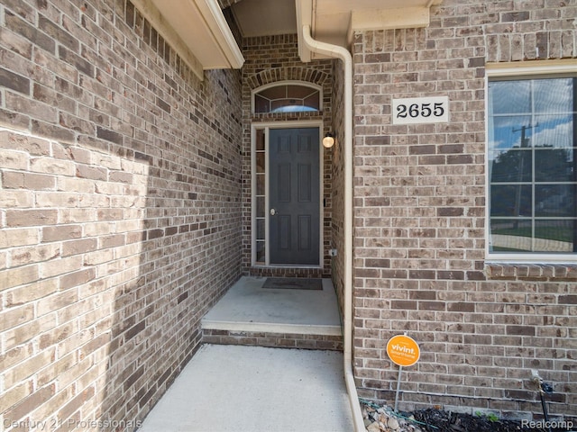 2655 Devondale Rd, Rochester Hills, MI 48309 - doorway to property featuring brick siding