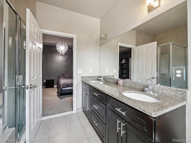 2655 Devondale Rd, Rochester Hills, MI 48309 - full bathroom with double vanity, ensuite bathroom, tile patterned floors, a stall shower, and a chandelier