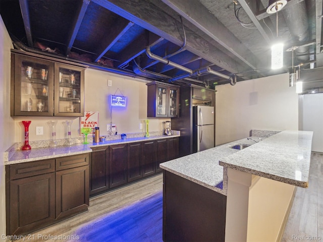 2655 Devondale Rd, Rochester Hills, MI 48309 - indoor dry bar featuring freestanding refrigerator and light wood-type flooring