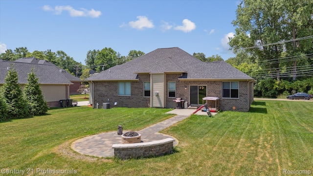 2655 Devondale Rd, Rochester Hills, MI 48309 - back of house featuring a fire pit, a patio, a yard, and brick siding