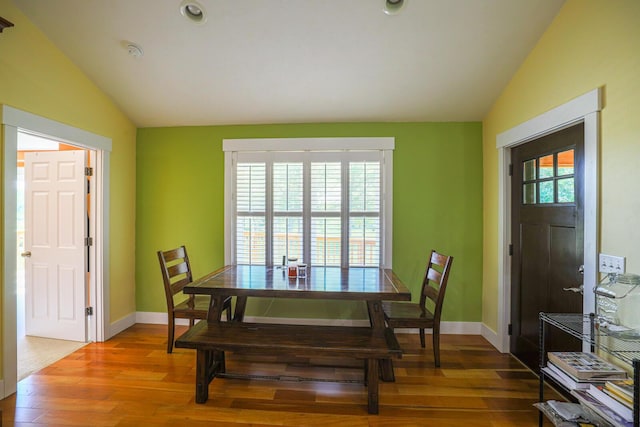 9434 84th St SE, Alto, MI 49302 - dining space with vaulted ceiling and wood finished floors