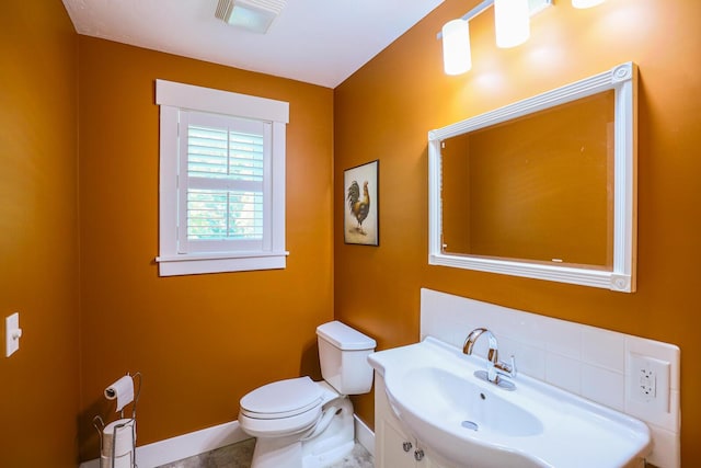 9434 84th St SE, Alto, MI 49302 - bathroom with toilet and vanity