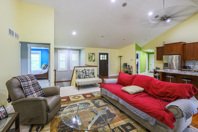 9434 84th St SE, Alto, MI 49302 - living room featuring ceiling fan, high vaulted ceiling, recessed lighting, healthy amount of natural light, and wood finished floors