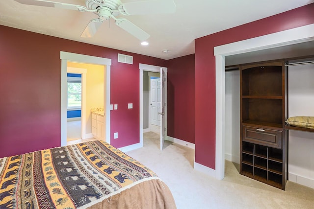 9434 84th St SE, Alto, MI 49302 - bedroom with light colored carpet, recessed lighting, a closet, and ceiling fan
