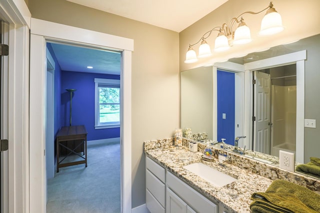 9434 84th St SE, Alto, MI 49302 - bathroom featuring vanity and a shower
