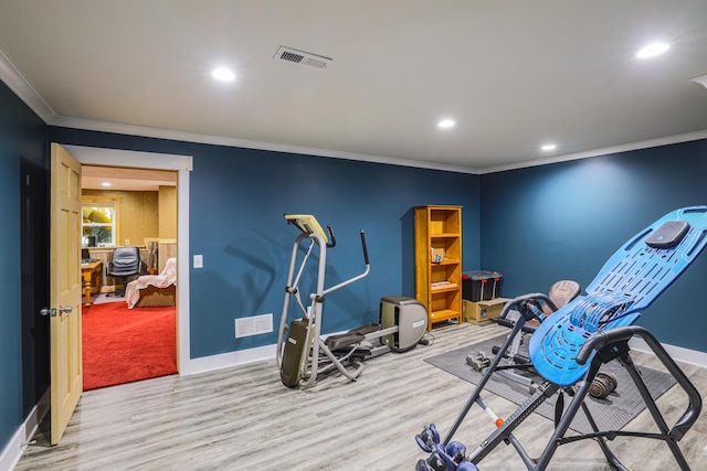 9434 84th St SE, Alto, MI 49302 - workout area with ornamental molding, wood finished floors, and recessed lighting