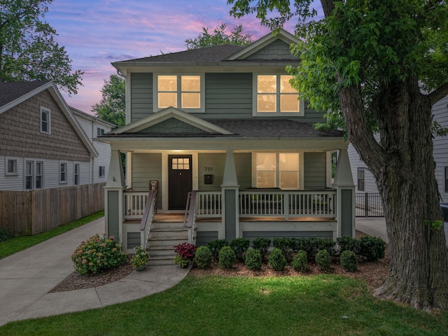 711 N Alexander Ave, Royal Oak, MI 48067 - american foursquare style home featuring a porch, roof with shingles, and driveway
