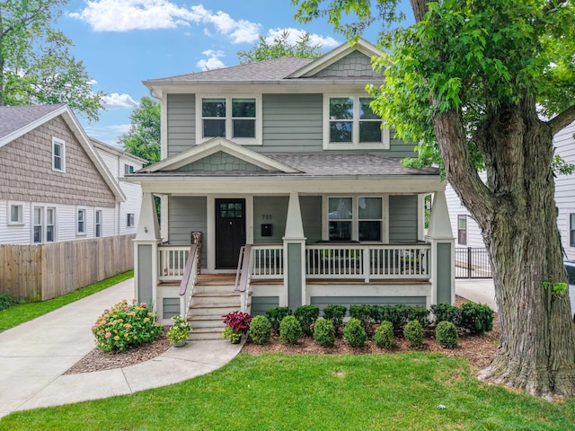 711 N Alexander Ave, Royal Oak, MI 48067 - view of front of property featuring a porch, a shingled roof, and driveway