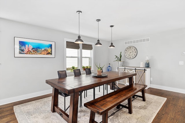 711 N Alexander Ave, Royal Oak, MI 48067 - dining room featuring baseboards and wood finished floors