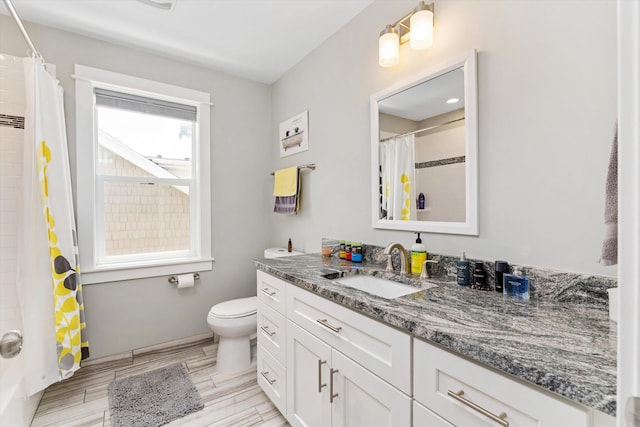 711 N Alexander Ave, Royal Oak, MI 48067 - bathroom with vanity, wood finish floors, and a shower with curtain