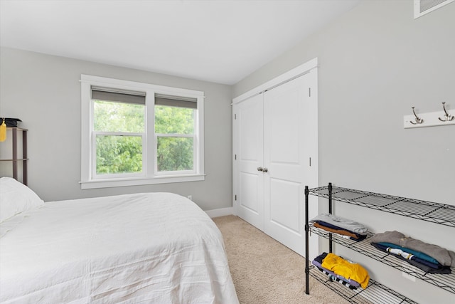 711 N Alexander Ave, Royal Oak, MI 48067 - bedroom with light carpet and a closet