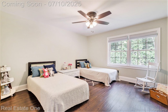 359 High Bluffs Dr, Ortonville, MI 48462 - bedroom featuring dark wood-style flooring and a ceiling fan
