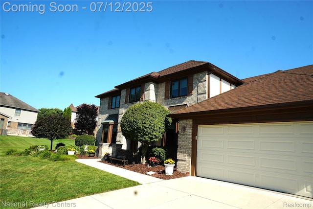 19230 Augusta Ct, Livonia, MI 48152 - view of front of house featuring a front lawn, driveway, a shingled roof, brick siding, and a garage