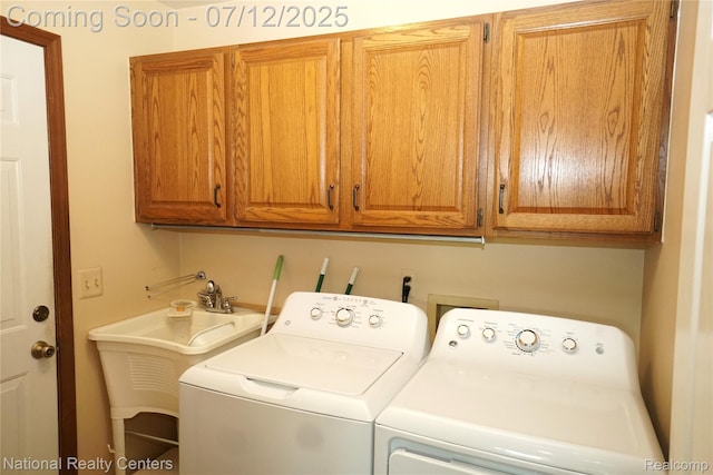 19230 Augusta Ct, Livonia, MI 48152 - laundry area featuring washer and dryer and cabinet space