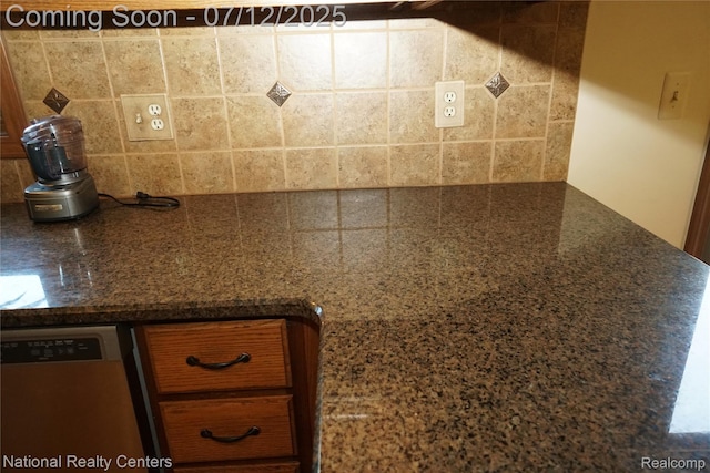 19230 Augusta Ct, Livonia, MI 48152 - kitchen view of dishwasher, decorative backsplash, dark countertops, and brown cabinets