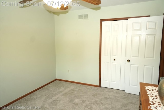 19230 Augusta Ct, Livonia, MI 48152 - unfurnished bedroom featuring carpet, a closet, and a ceiling fan