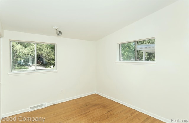 2931 N Main St, Royal Oak, MI 48073 - empty room featuring baseboards and light wood-style floors