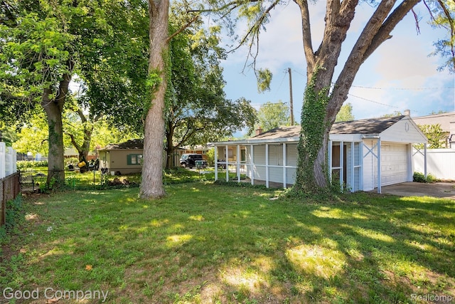 2931 N Main St, Royal Oak, MI 48073 - view of yard with a garage and a sunroom