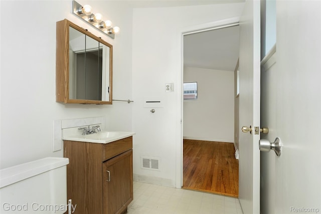 2931 N Main St, Royal Oak, MI 48073 - half bath with vanity and tile patterned floors