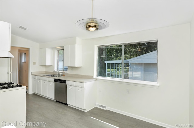 2931 N Main St, Royal Oak, MI 48073 - kitchen with dishwasher, white cabinets, ventilation hood, light countertops, and white gas range oven