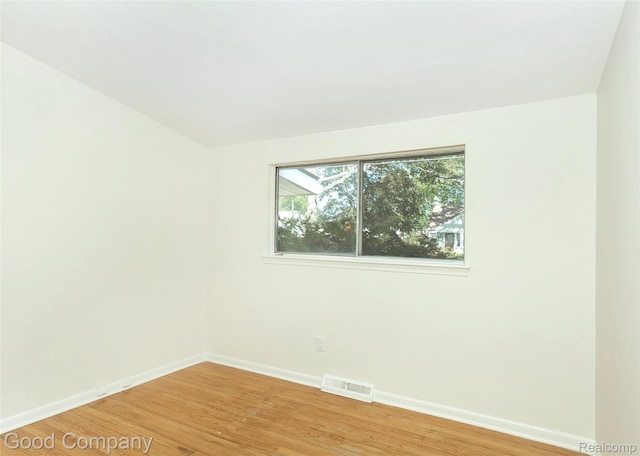 2931 N Main St, Royal Oak, MI 48073 - empty room featuring baseboards and light wood-type flooring