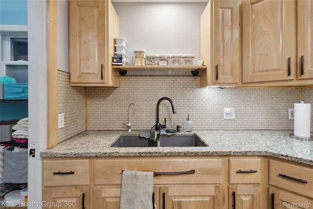 204 W Caroline St, Bellevue, MI 49021 - kitchen featuring light brown cabinetry, backsplash, light stone countertops, and open shelves
