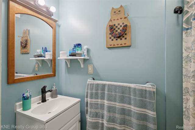 204 W Caroline St, Bellevue, MI 49021 - full bathroom with vanity
