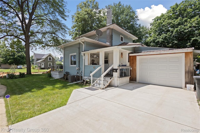 204 W Caroline St, Bellevue, MI 49021 - view of front of house with driveway, an attached garage, a front lawn, a porch, and a chimney