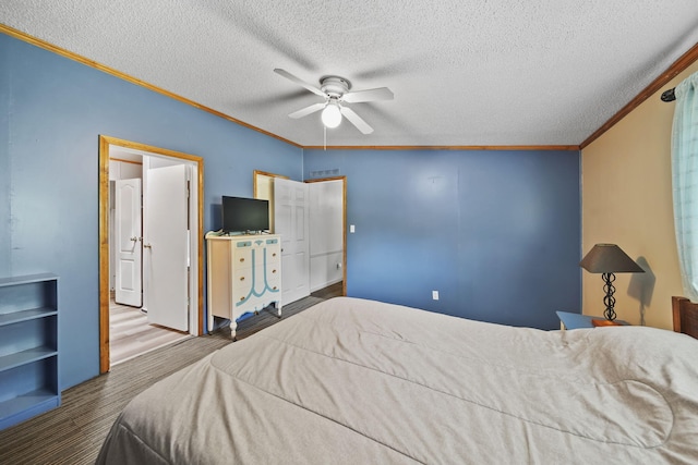 8756 Portage Lake Rd, Munith, MI 49259 - bedroom with ornamental molding, wood finished floors, a textured ceiling, and ceiling fan